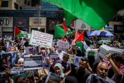 Palestinians f protest following the killing of Hamas leader Ismail Haniyeh in Iran, in the West Bank city of Hebron, August 3, 2024.