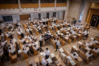 Yeshiva students study at the Kamenitz Yeshiva, in Jerusalem on August 22, 2023